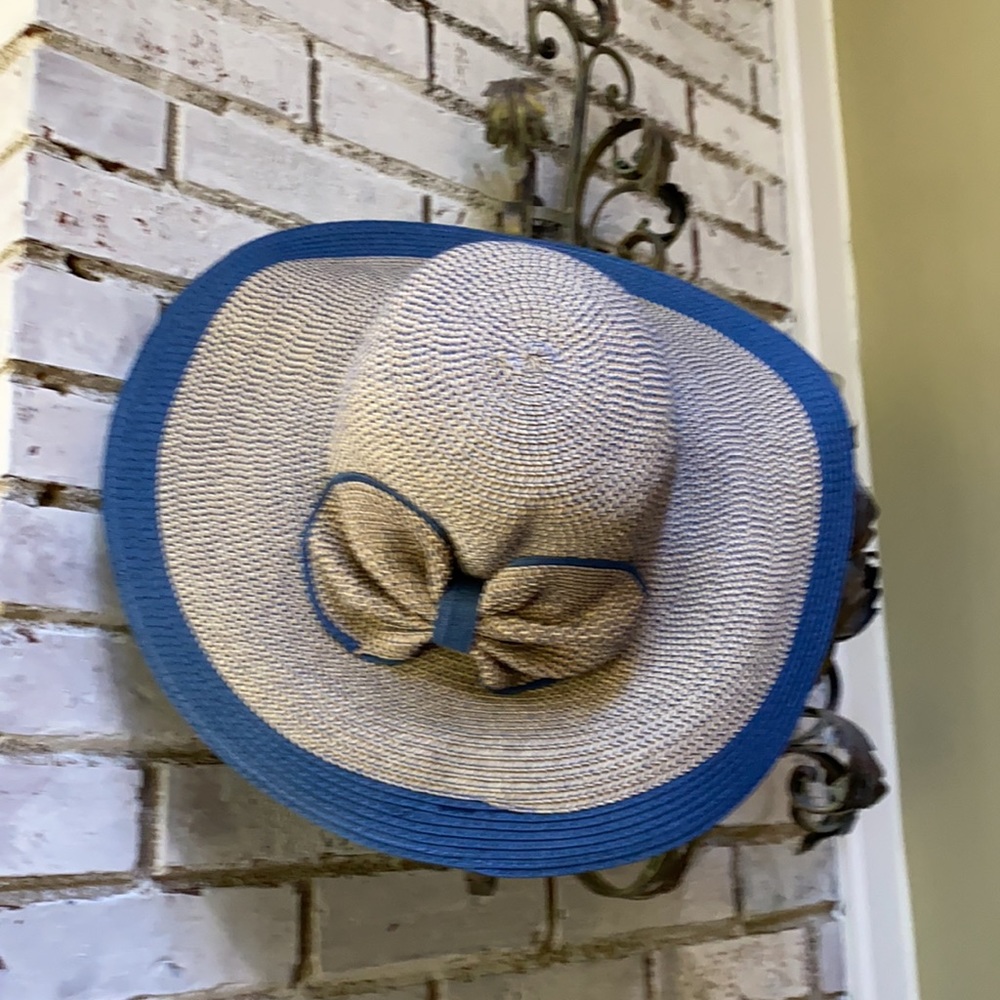 floppy straw hat with large bream.